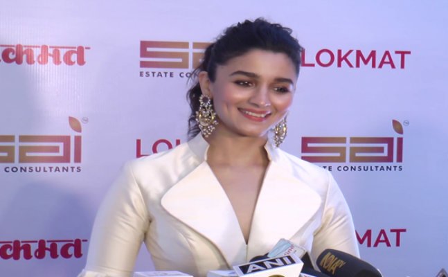 Alia Bhatt in cream & beige-coloured long skirt