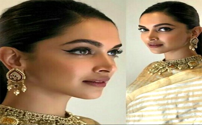 Deepika Padukone looks ETHEREAL in golden striped saree 