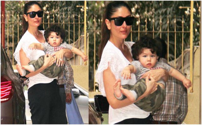 Taimur’s gets restless as Kareena holds him in her arms